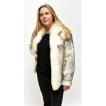 A vintage 1950s short cream and brown mink fur coat with dolman sleeves, no front closures and fully