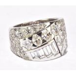 DE BEERS; an 18ct white gold and diamond 'So Chic' ring set with seventy nine variously cut and