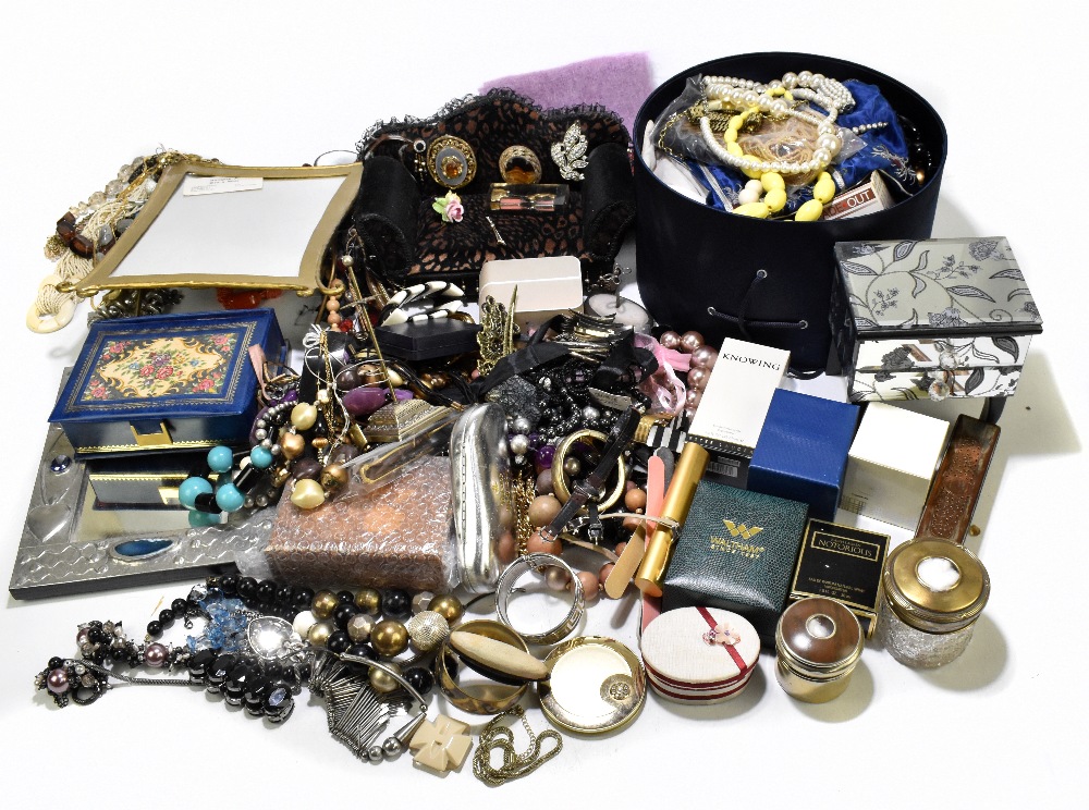An extensive collection of costume jewellery including brooches, necklaces, etc.
