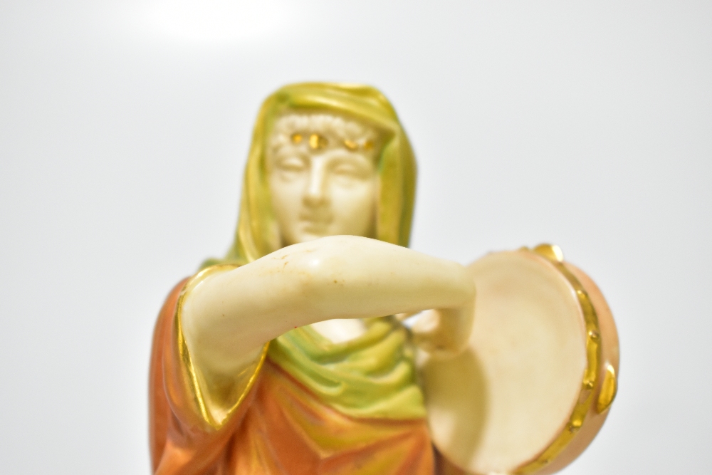 HADLEY ROYAL WORCESTER; a coloured blush ivory figure representing a maiden playing a tambourine, - Image 7 of 8