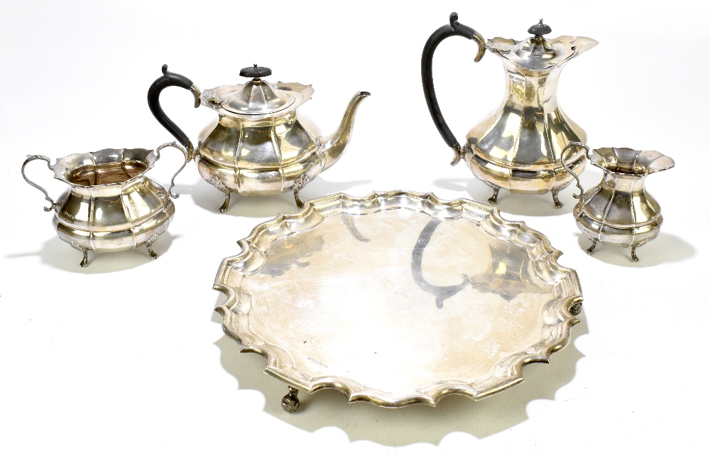 HAMILTON LAIDLAW & CB & CO; a George V hallmarked silver four piece tea set and tray, the tea set