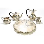 HAMILTON LAIDLAW & CB & CO; a George V hallmarked silver four piece tea set and tray, the tea set