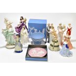 A collection of fourteen figures to include Royal Worcester 'Her Majesty Queen Elizabeth II',