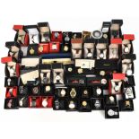 A large quantity of lady's and gentleman's fashion wristwatches by assorted makers, mostly boxed,