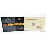 A Royal Mint 'Pure Excellence' 2010 quarter-sovereign, listed weight 1.99g, encapsulated in card