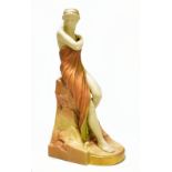 GEORGE EVANS FOR ROYAL WORCESTER; a coloured blush ivory figure ‘Isis’, impressed marks, puce