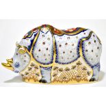 ROYAL CROWN DERBY; a limited edition 'White Rhino' paperweight, 922/1000, with gold stopper,