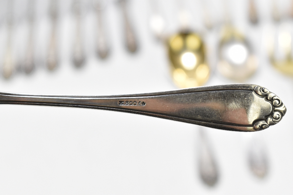 A German 800 grade thirty-two piece part canteen of cutlery each with cast floral detail, the - Image 5 of 12