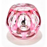 PERTHSHIRE; a limited edition faceted glass 'Seal' paperweight, with pink overlay, diameter 7cm,