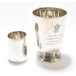 WALKER & HALL; a George V hallmarked silver mug with C-handle, on spreading circular foot, later