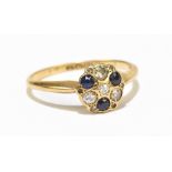 An 18ct yellow gold, diamond and sapphire cluster ring, size O 1/2, approx 2.6g (two small stones