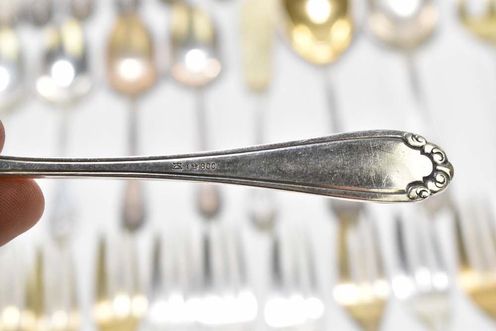 A German 800 grade thirty-two piece part canteen of cutlery each with cast floral detail, the - Image 2 of 12