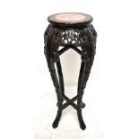 A Chinese rosewood jardinière stand, height 91.5cm, diameter 27.5cm.Additional InformationNumerous