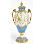NORITAKE; a Japanese porcelain twin handled lidded urn featuring enamelled panels, jewelled and gilt