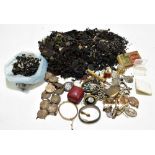 A mixed group of costume jewellery including rings, pendants, unmarked yellow metal mounted agate