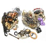 A selection of costume jewellery, including bead necklaces (qty).