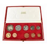 A South African 1971 ten coin set comprising gold two and one rand coins, approx 12.0g, a silver one