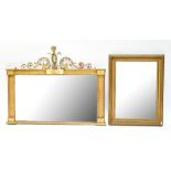 A 19th century gilt wood and gesso rectangular over mantel mirror with scroll work surmount and