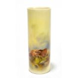 JAMES STINTON FOR ROYAL WORCESTER; a hand painted cylindrical vase decorated with highland cattle,