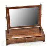 An Edwardian mahogany and inlaid dressing table mirror with two drawers to rectangular base on