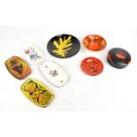 POOLE POTTERY; eight pieces including a pin dishes, length 18cm, three pieces decorated in the '