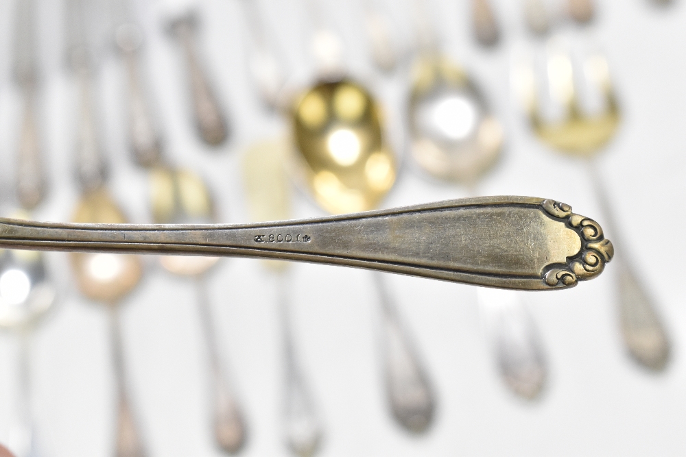 A German 800 grade thirty-two piece part canteen of cutlery each with cast floral detail, the - Image 3 of 12