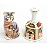ROYAL CROWN DERBY; a paperweight in the form of a seated cat with gold plug, height 13.5cm, and a