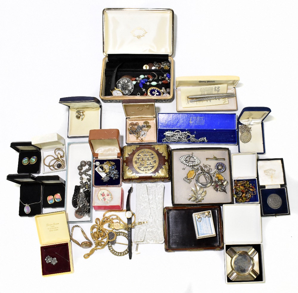A quantity of costume jewellery including brooches, beads, cufflinks, earrings, also fashion