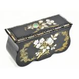 A Victorian lacquered papier-mâché sewing box of serpentine rectangular form, the top and sides gilt