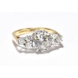 An 18ct yellow gold diamond and moissanite dress ring, size M 1/2, approx. 5.6g.Additional