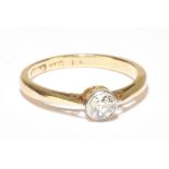 An 18ct yellow gold diamond solitaire ring, the diamond weighing approx 0.20ct, size H, approx 1.