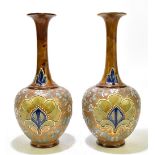 ROYAL DOULTON; a large pair of stoneware floral motif vases, impressed marks and number 5790 to