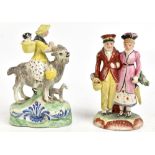 Two early 19th century Staffordshire figures comprising 'The Welch Tailor's Wife', height 18cm,