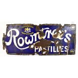 An original enamel sign advertising Rowntree's Pastilles, 39 x 92cm (af).Additional