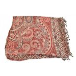 A large red, brown and gold 100% wool fringed edged paisley shawl, approx 325 x 300cm.Additional