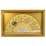 A cased Chinese fan with mother of pearl sticks and painted rice paper main body, width approx