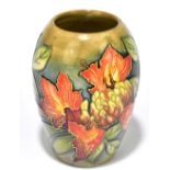 MOORCROFT; a 'Flame of the Forest' pattern ovoid vase, impressed and painted marks to the underside,