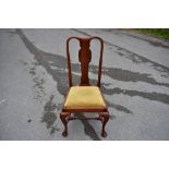 A set of six 1920s Queen Anne style mahogany dining chairs with upholstered drop-in seats, on