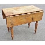 A Victorian pine Pembroke table, with frieze drawer on turned and tapered legs, height 76cm, width