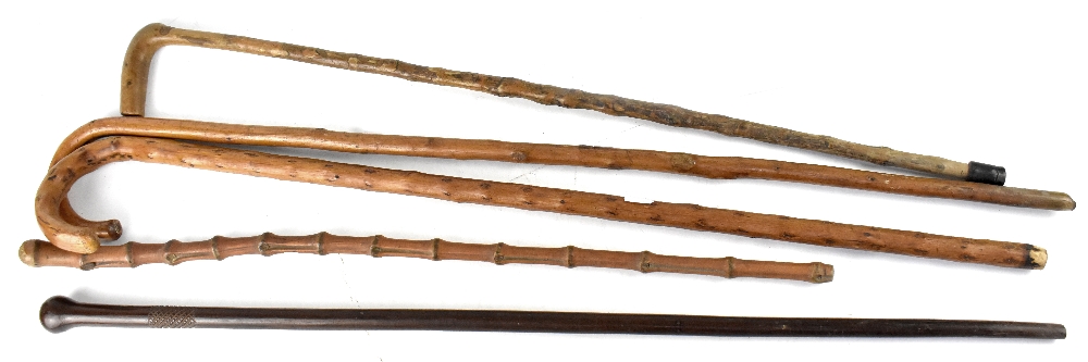 Five various walking/swagger sticks (5).