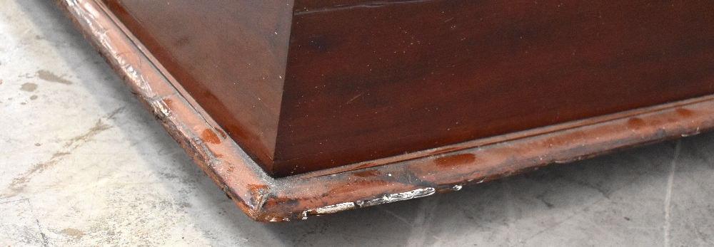 A mahogany ottoman with upholstered padded seat lid, raised on squat bun feet, 57 x 105 x 54cm. - Image 3 of 3