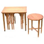 A 1960s retro teak coffee table containing four smaller gateleg drop-leaf tables,