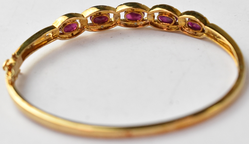 A 9ct gold diamond and ruby hinged bangle, - Image 2 of 2