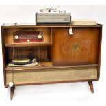 A Charterway Coachcraft, Formby, Lancashire walnut veneered radiogram with integral tuner,