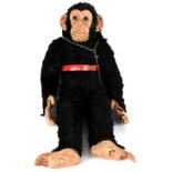 A Deans Ragbook stuffed toy monkey with latex face, ears, hands and feet,