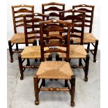 A set of six 18th century ladder back rush seated chairs with four rails,