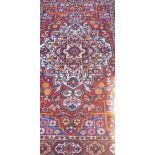 A fine Persian handmade Bakhtiari rug, 208 x 142cm.