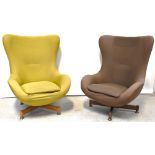 A pair of 1960s injection moulded swivel egg chairs, raised on four supports to brass feet (2).