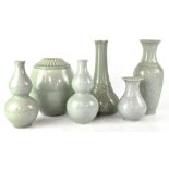 Six 20th century Chinese-style celadon vases of various forms,