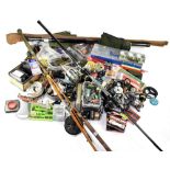 A large collection of various fishing gear to include three vintage split cane rods,